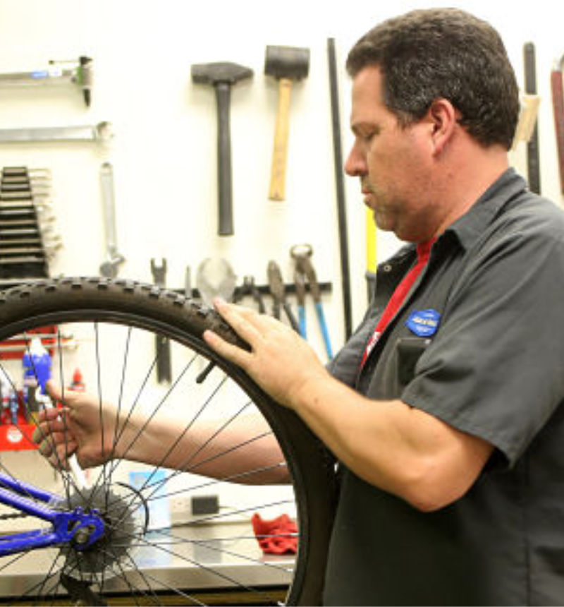 Bicycle rear wheel being serviced